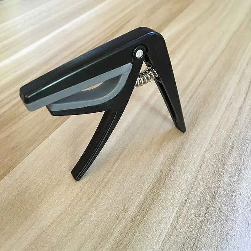 

1Pcs Foreign Trade New Musical Instrument Accessories Ukulele Capo Suitable for Guitar Ukulele