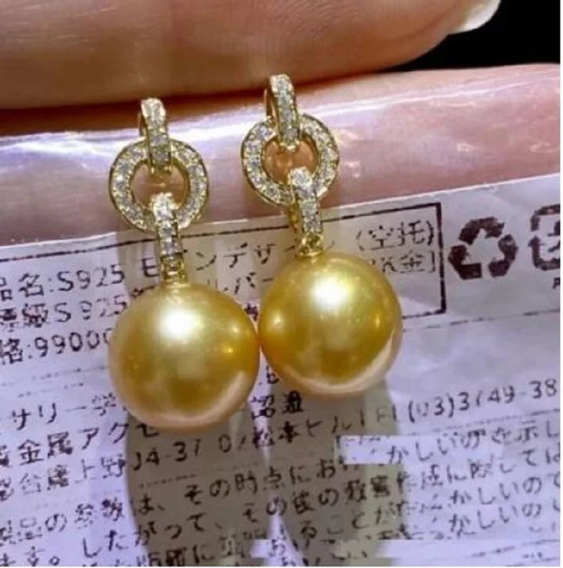 

HUGE AAAA 10-11mm real south sea ROUND natural Golden pearl earring 925S....