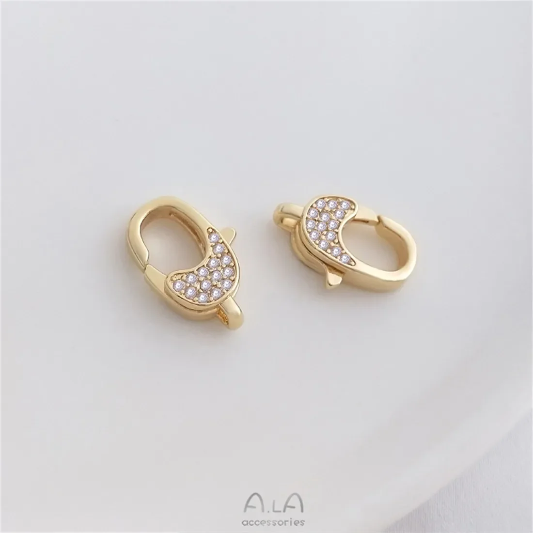 Пружинная пряжка с микроинкрустацией цирконом 14-каратное золото пятиконечная