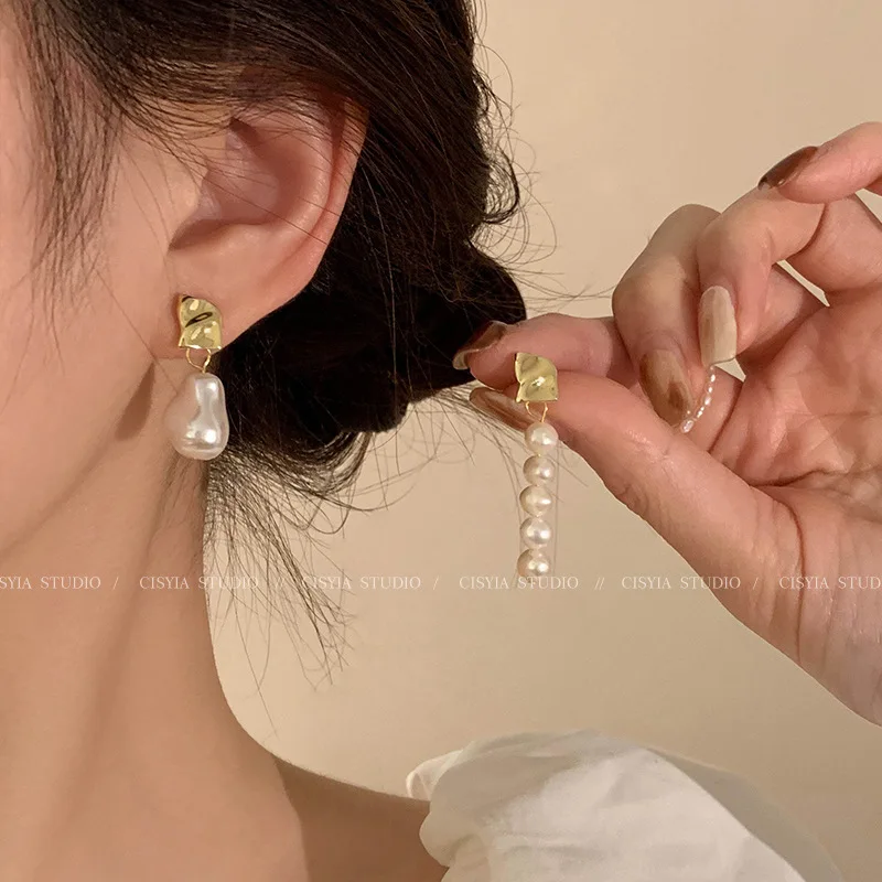 Женские серьги-гвоздики с натуральным пресноводным жемчугом 14 к