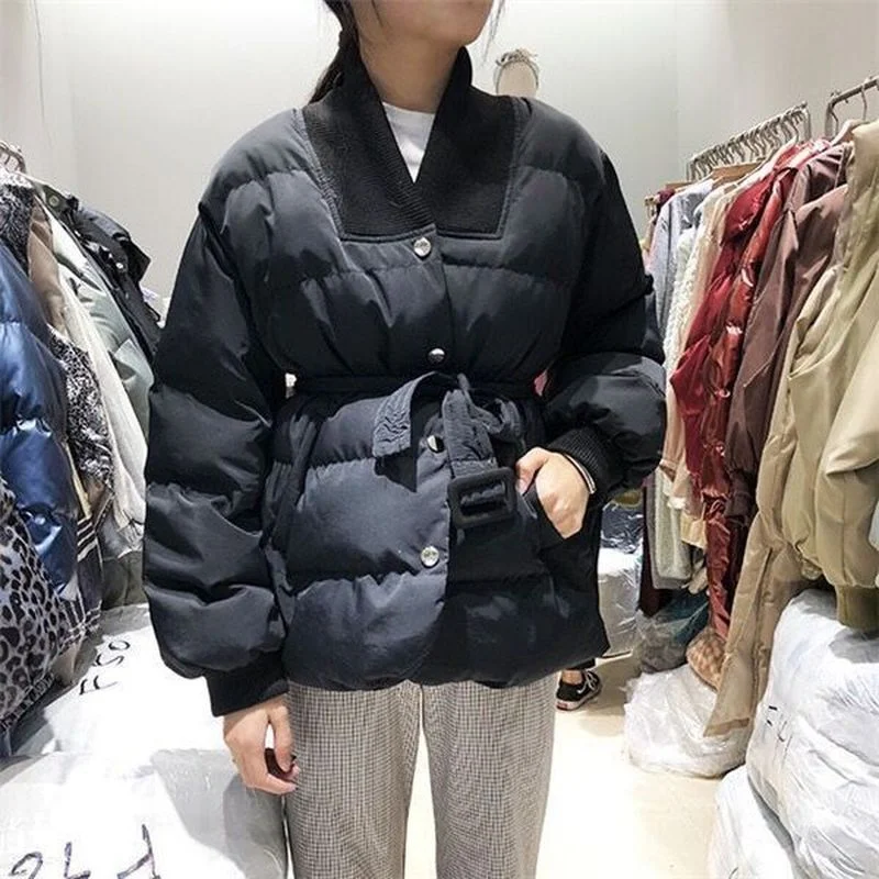 Fashionable Version of The V-neck Winter Waist Waist Waist Warmth Pure Color Wild Loose Belt Jacket Thickened Office Ladies