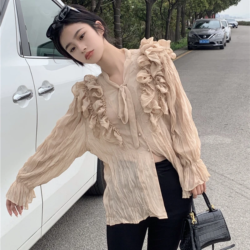 

New spring niche design French fold ribbon trumpet sleeves solid color temperament high-grade shirt girl 86a,420-3