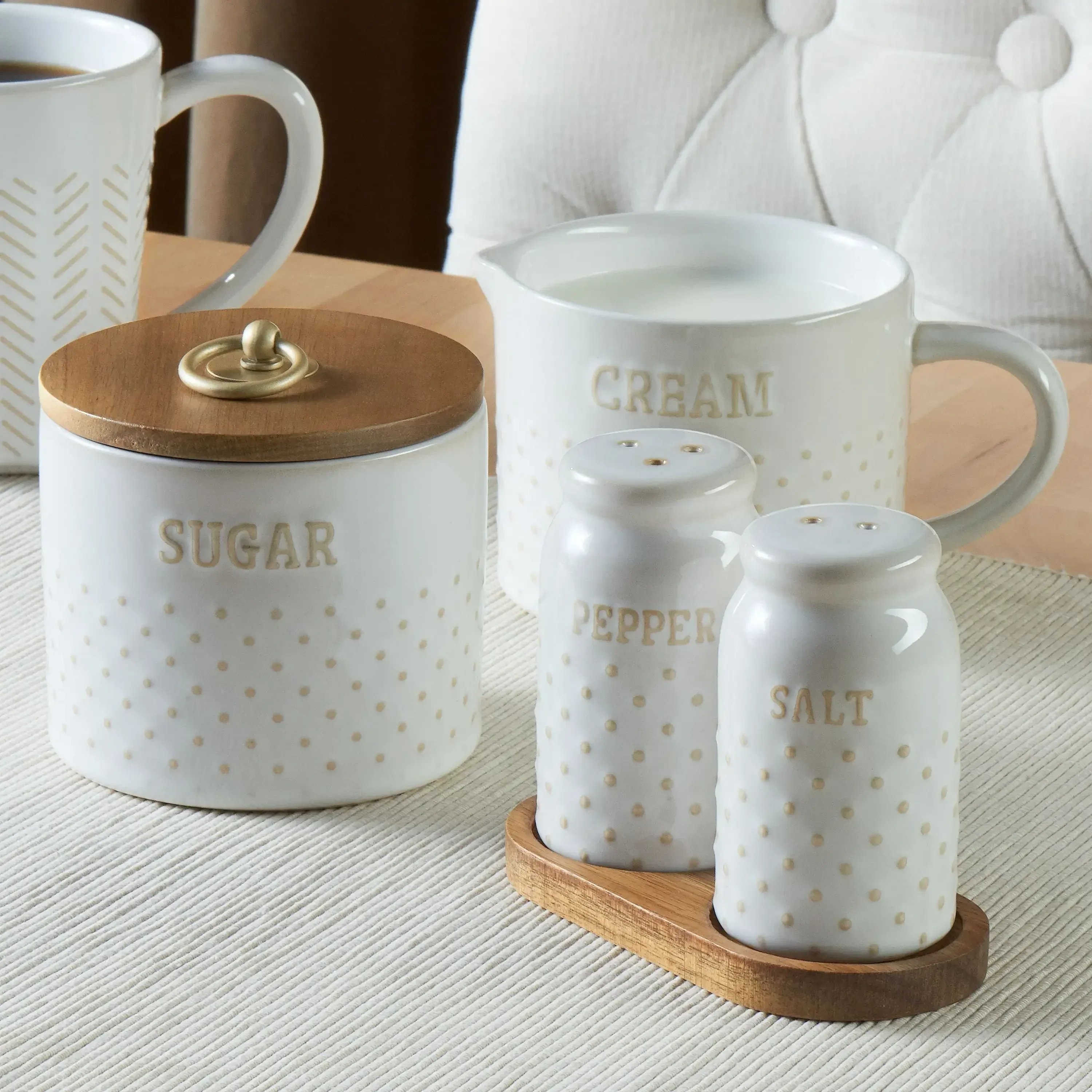 

g Farmhouse 4-Piece Dotted Sugar Cannister, Creamer, and Salt and Pepper Shaker Set in White spice jar