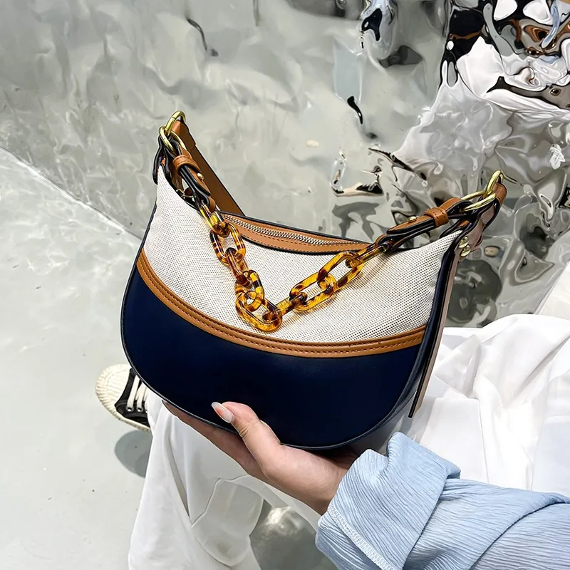 

2023 Trendy PU Leather and Canvas Contrast Color Acrylic Chain Portable Selenodont Bag Crossbody Bags for Women High Quality