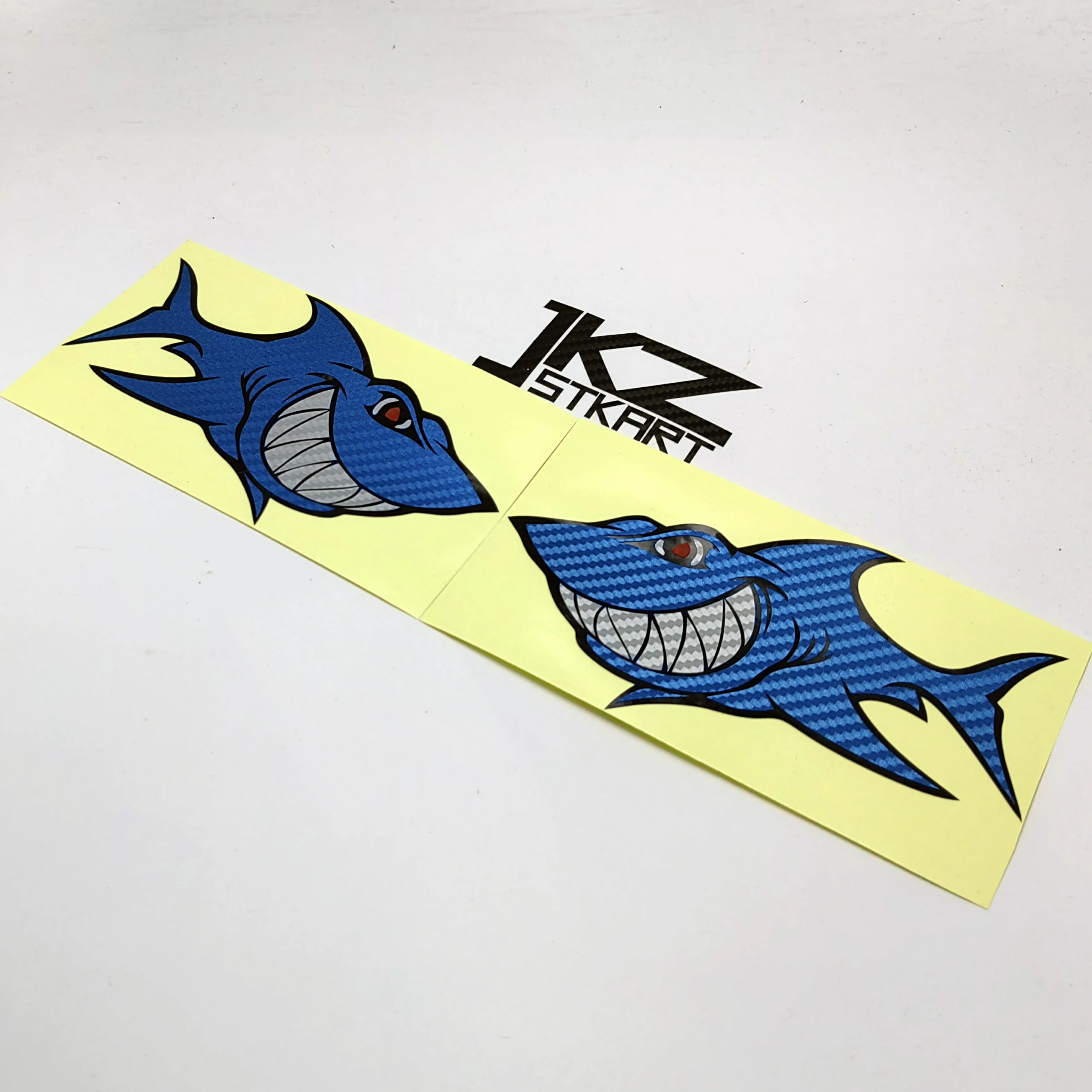 A Pair of Sticker Cartoon Smile Shark Vinyl Die Cut Blue Carbon Fiber Decal 150mmx88mm For Car Motorcycle ATV Laptop Guitar