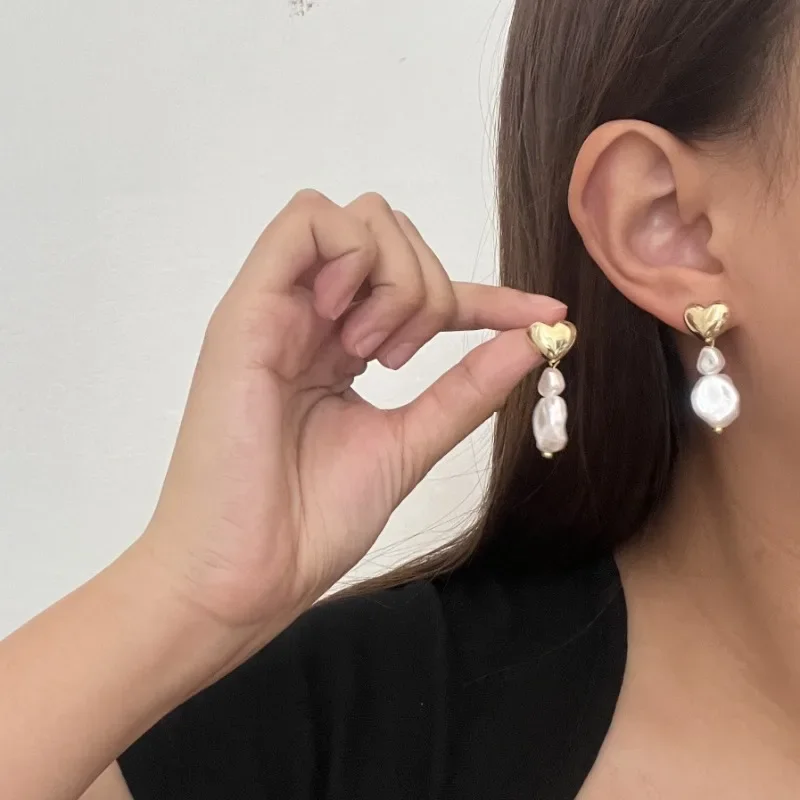 Женские серьги-подвески с жемчугом