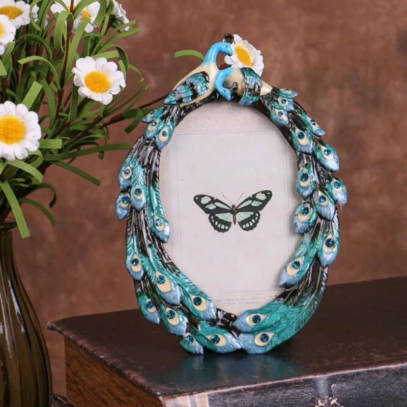 

Металлическая фоторамка "Цветочная птица"