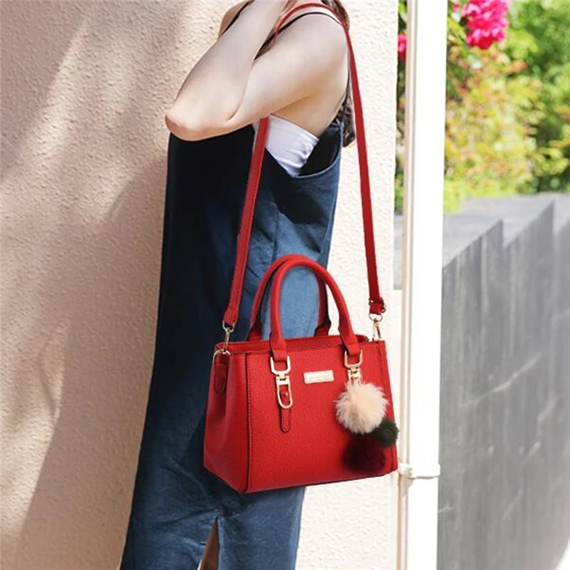 

Роскошная дамская сумочка, винтажный кожаный мессенджер на плечо с помпоном для волос