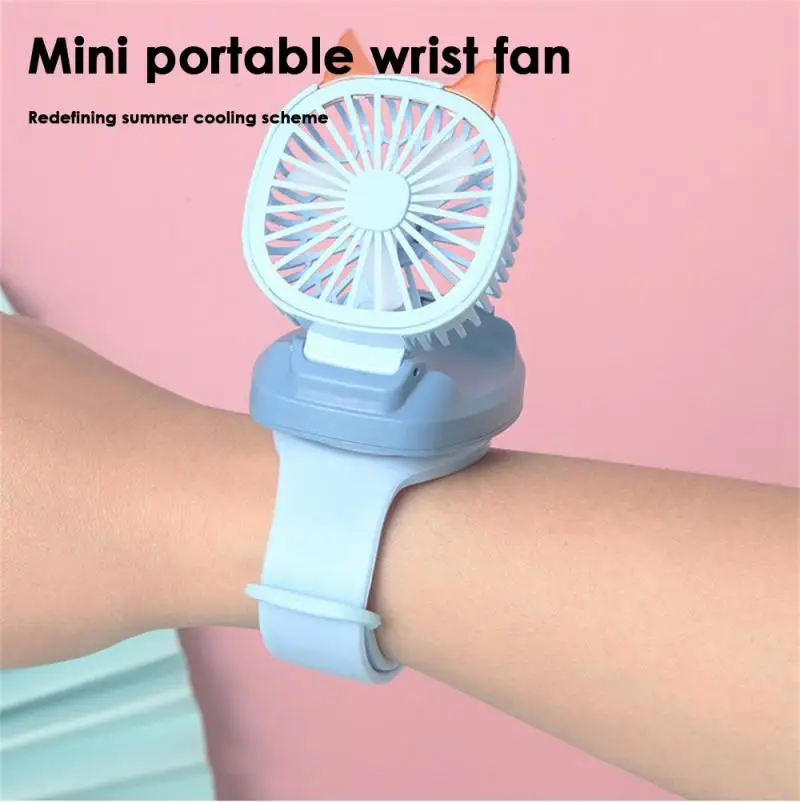 

360-degree Rotation Design Mini Cartoon Wristband Fans Portable 90-degree Standing Up And Down Air Conditioning Usb Charging