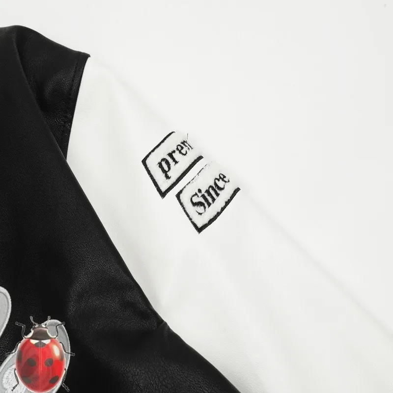 Куртка мужская кожаная в стиле пэчворк с вышитыми цветами