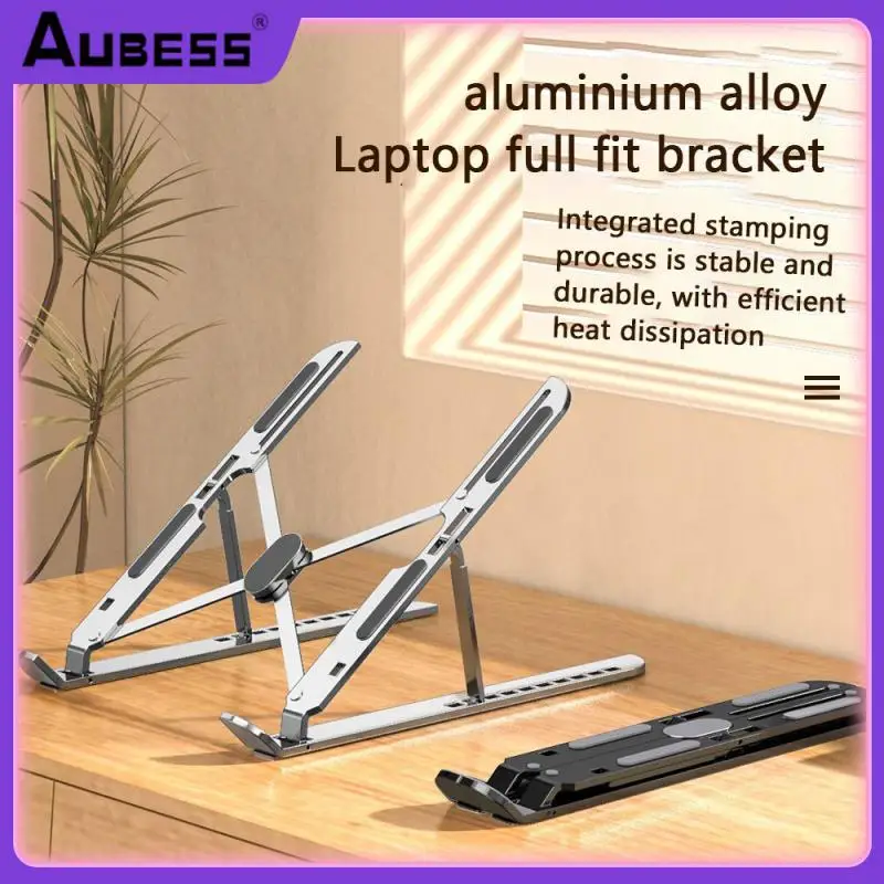 

Easy To Fold And Carry Aluminum Laptop Stand High Standard Dual Axis Design Anti Slip Design At The Bottom Desktop Laptop Stand