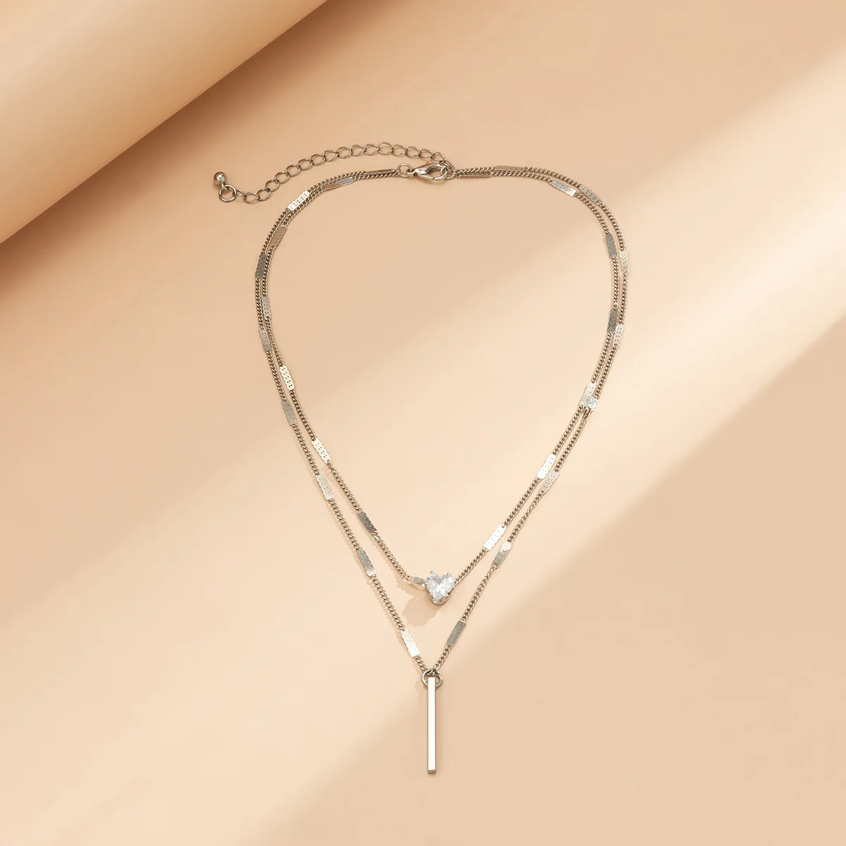 Jewelry fashion metal wind Joker double pendant simple temperament drops love rhinestone necklace.