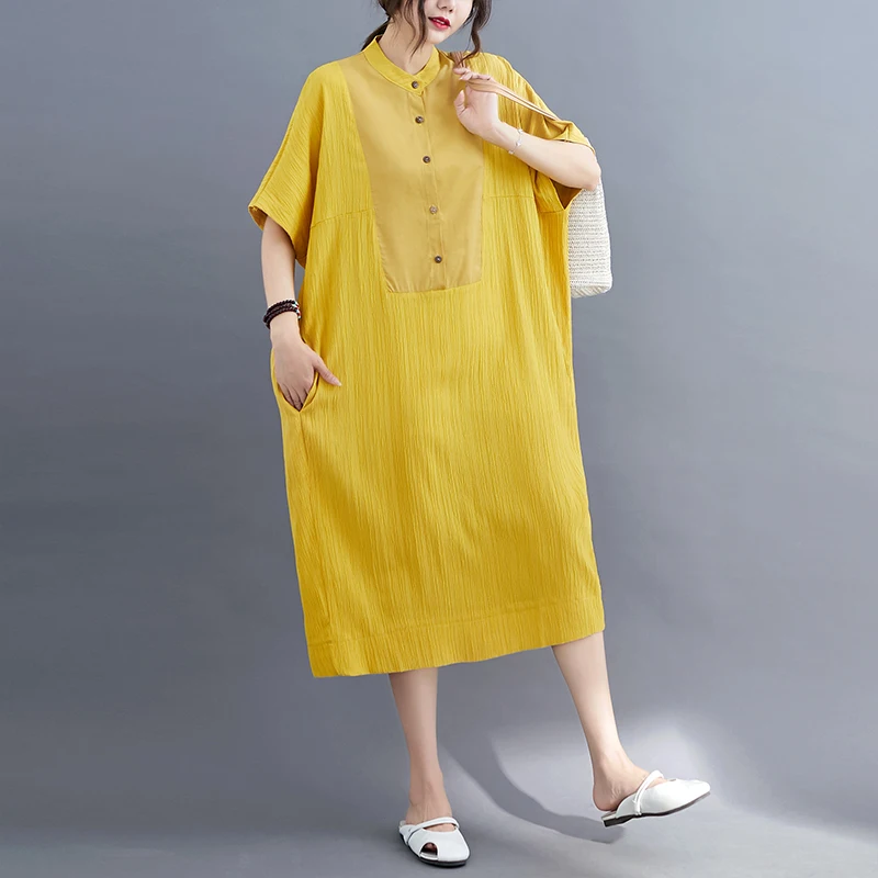 

Женское платье средней длины с коротким рукавом и круглым вырезом