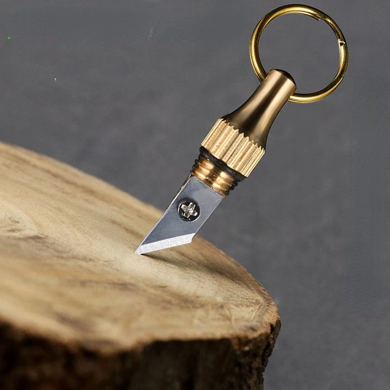 

Creative brass keychain outdoor portable knife multifunctional open express knife car electric car keychain