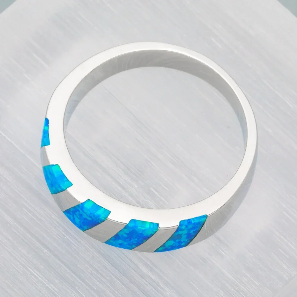KONGMOON Серебряное кольцо с ониксом Ocean Blue Fire Opal