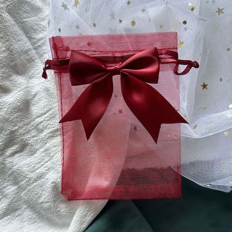 

Подарочные пакеты из органзы с бантом