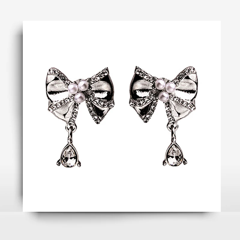 

Light Luxury Bow Earrings for Women's Silver Needle Pearl Inlaid Moonlight Stone Earring Sweet Cool Style Girls Earwear Jewelry