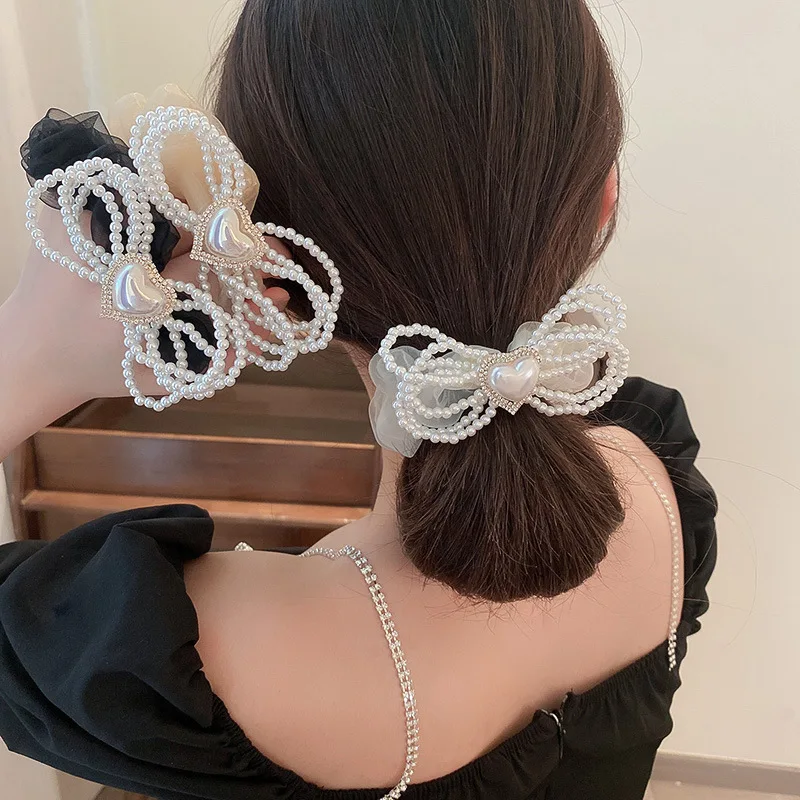

Head flower senior bow knot headdress head rope female new style horsetail simple temperament hair accessory hair rope summer