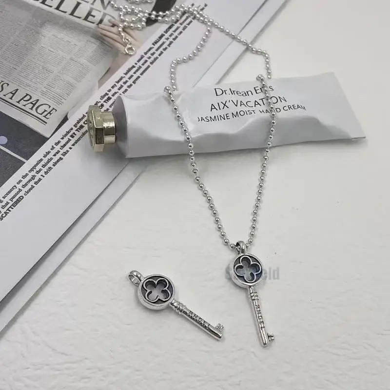 

S925 pure silver fashion niche design key pendant necklace personality female cool joker wholesale sweater chain