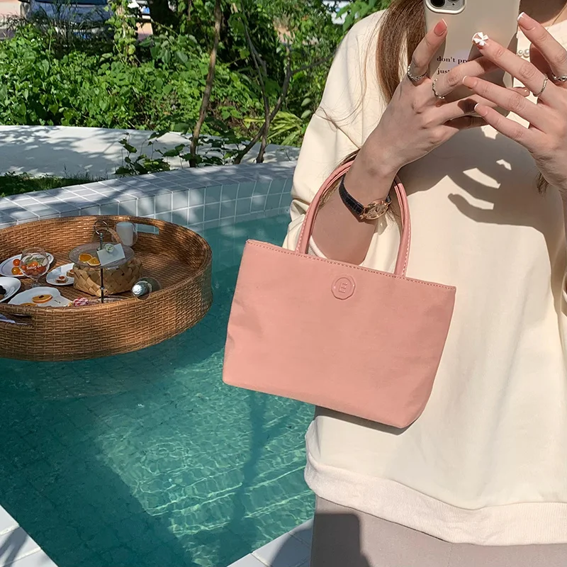 

Корейская нишевая дизайнерская розовая мини нейлоновая сумка-тоут в стиле Instagram, новинка 2022, женская летняя сумка
