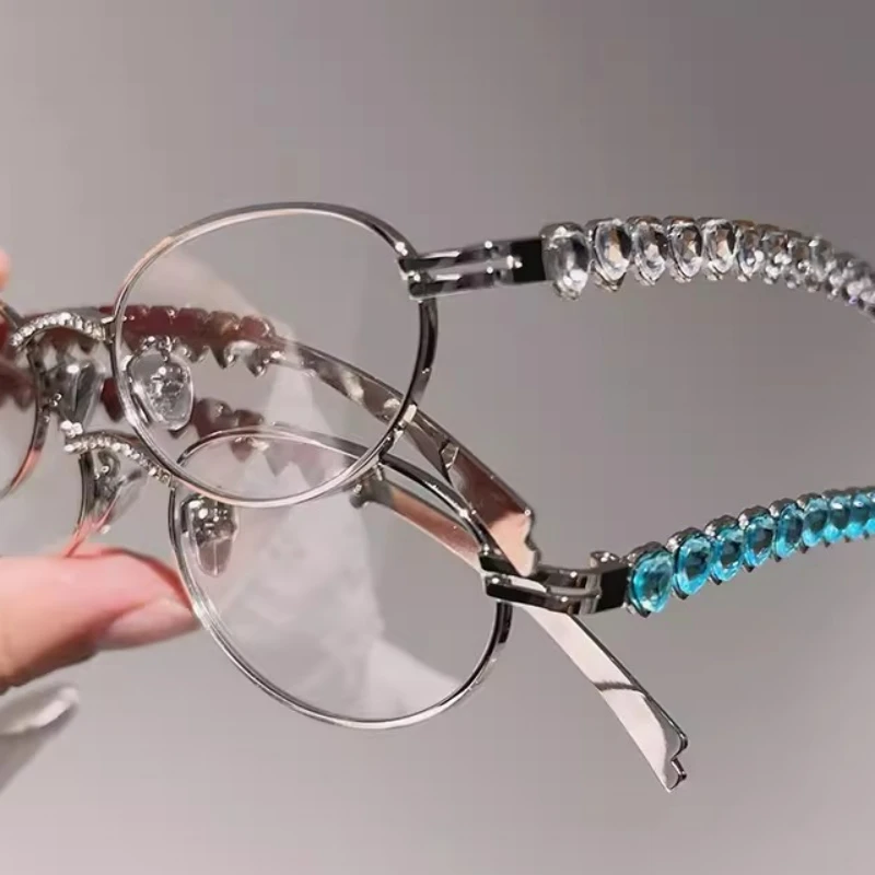 Очки солнцезащитные унисекс в металлической овальной оправе