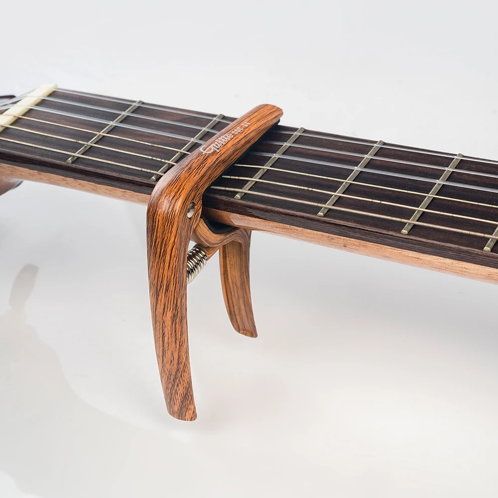 Фото JOYO GGC-04 Guitto серии гитарный каподастр, регулируемый зажим для настройки, цинковый сплав, чистый звук и удобный для акустических электрогитар №3