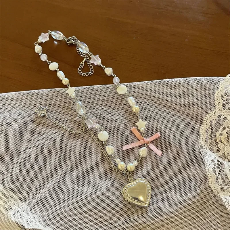 Ожерелье в форме сердца с бантом и звездами