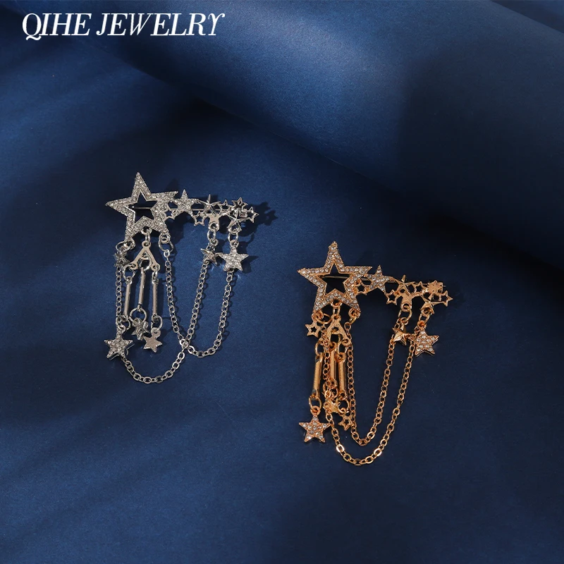 Женская брошь в форме скрипки золотого и серебряного цвета