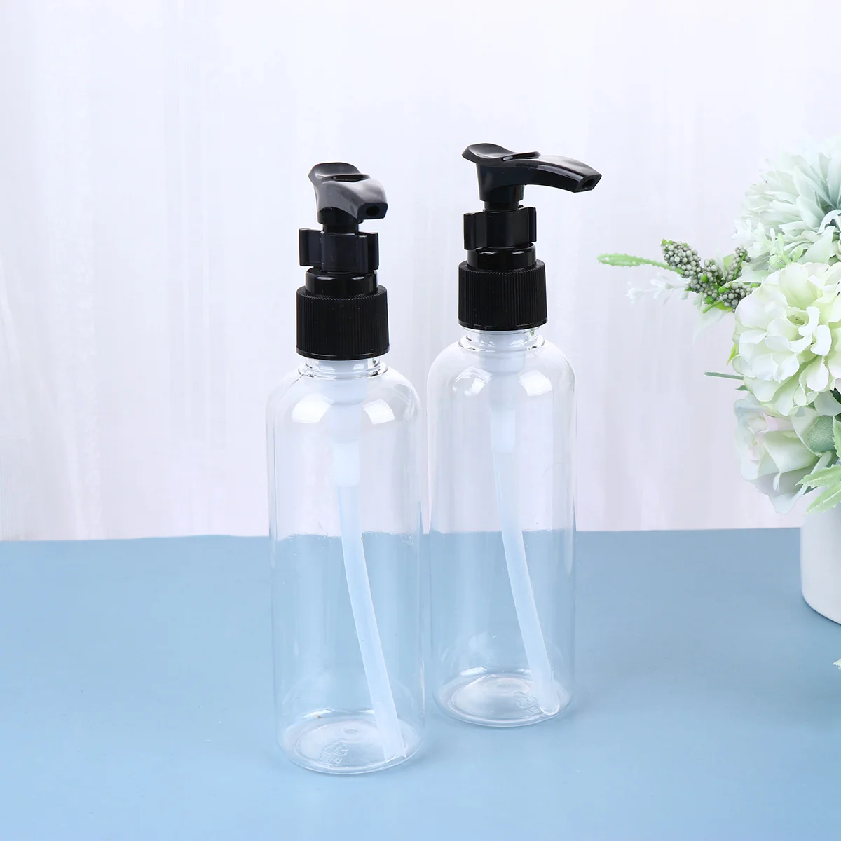 

4 PCS Portable Bottle Pump Toiletries Shampoo Emulsion Liquid Dispenser Travel Lotion