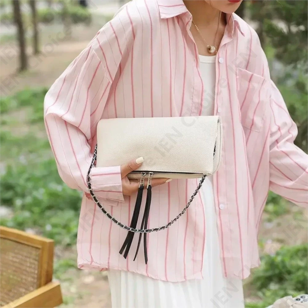 Женская кожаная сумка через плечо с двумя цепочками