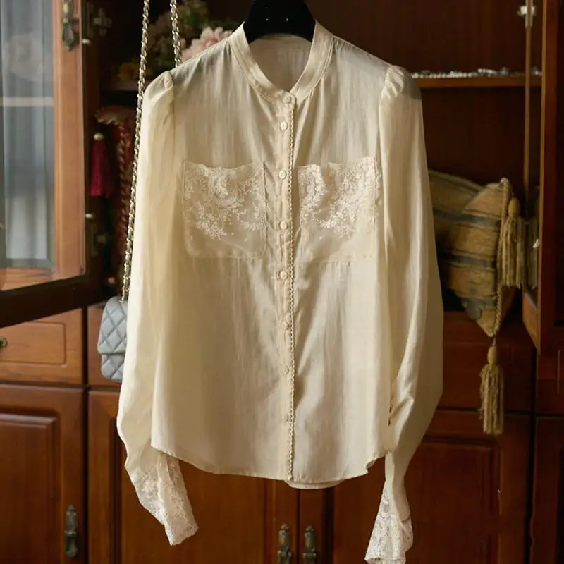 

Женская кружевная блузка с воротником-стойкой и плиссированным рукавом