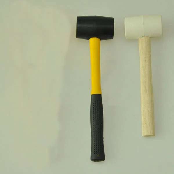 

Rubber Hammer Hammer the cork into the bottle of wine High Quality Black White