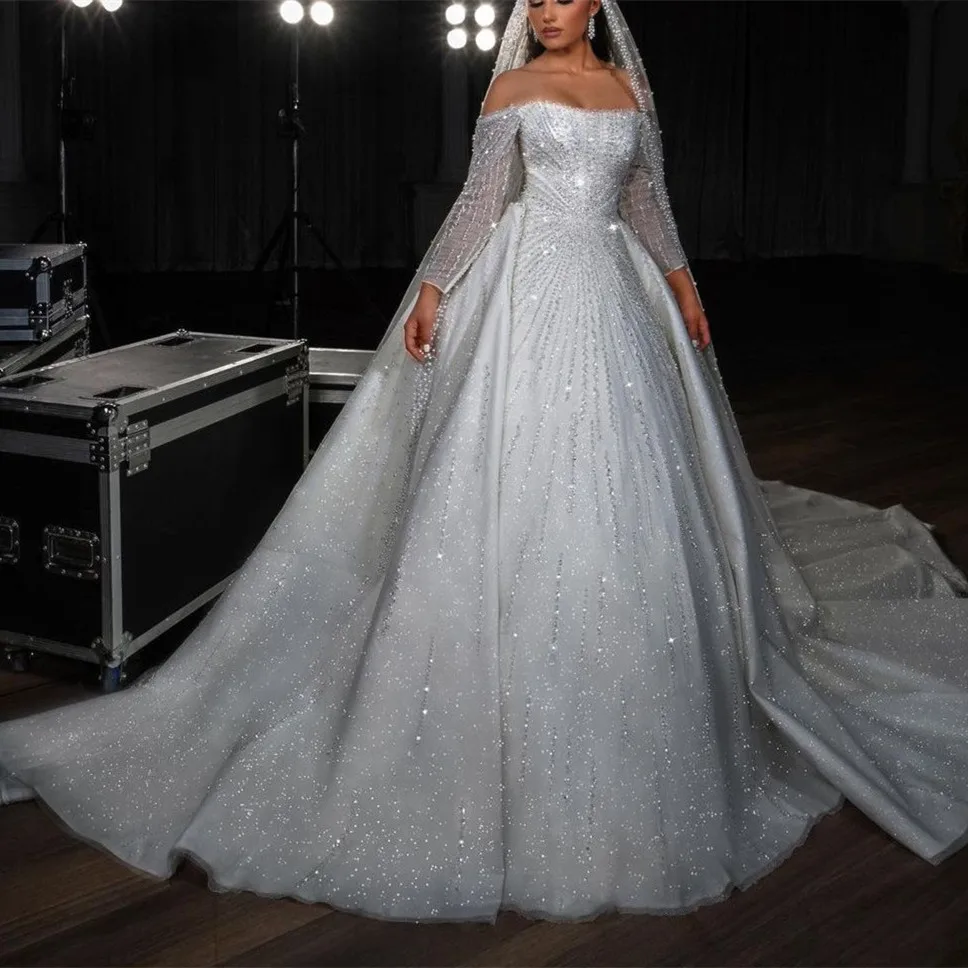 

Sparkly Ball Gown Wedding Dresses Long Sleeves Bateau Sequins Appliques Beaded Detachable Train Bridal Gowns Vestina De Novia