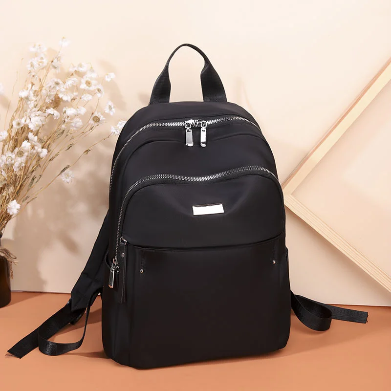 

Женская сумка, новый рюкзак из ткани Оксфорд, модная простая однотонная школьная сумка, вместительная трендовая дорожная сумка