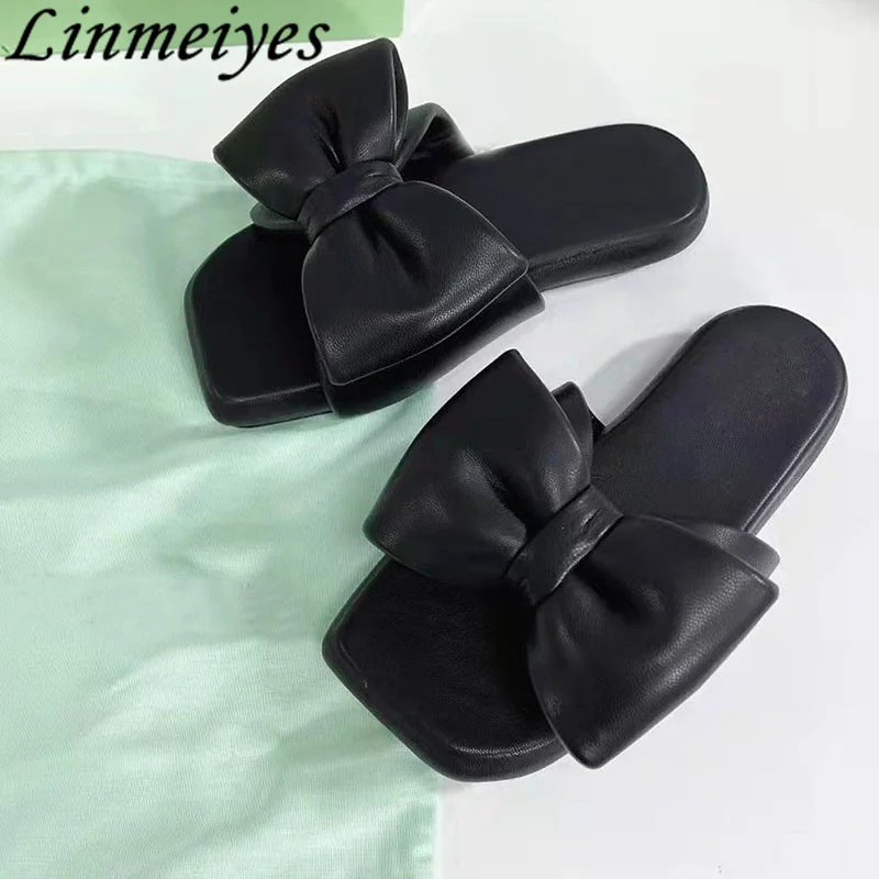 

Мюли женские из натуральной кожи, модельные шлепанцы на плоской толстой подошве, с бантом-бабочкой, удобные сланцы, современные тапочки, лет...