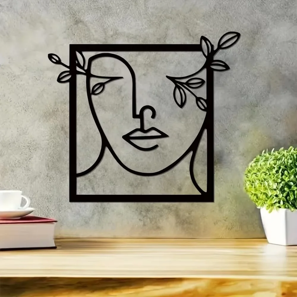 Металлическая стена искусство женщина лицо с листьями-символ элегантности.