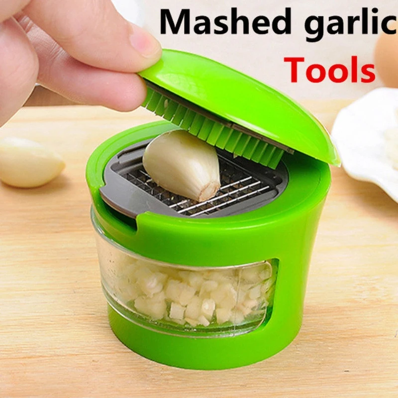 

Garlic Press Crusher Food Processors And Storage Container Includes Silicone Garlic Peeler Easy To Clean Stainless Steel Blades