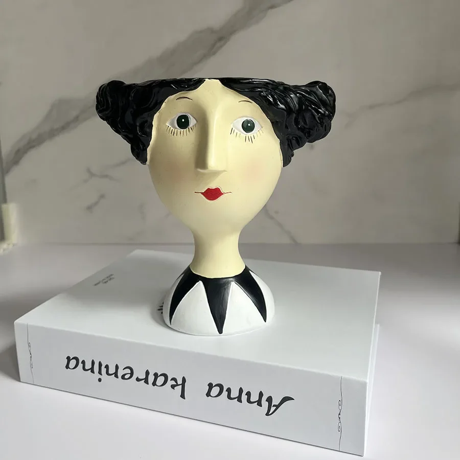 

Портретные цветочные горшки из смолы