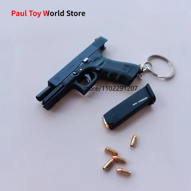 

Portable Gun Model Keychain Glock G17 Pistol Shape Keychain Mini Metal PUBG M29F Desert Eagle Shell Ejection Free Assembly