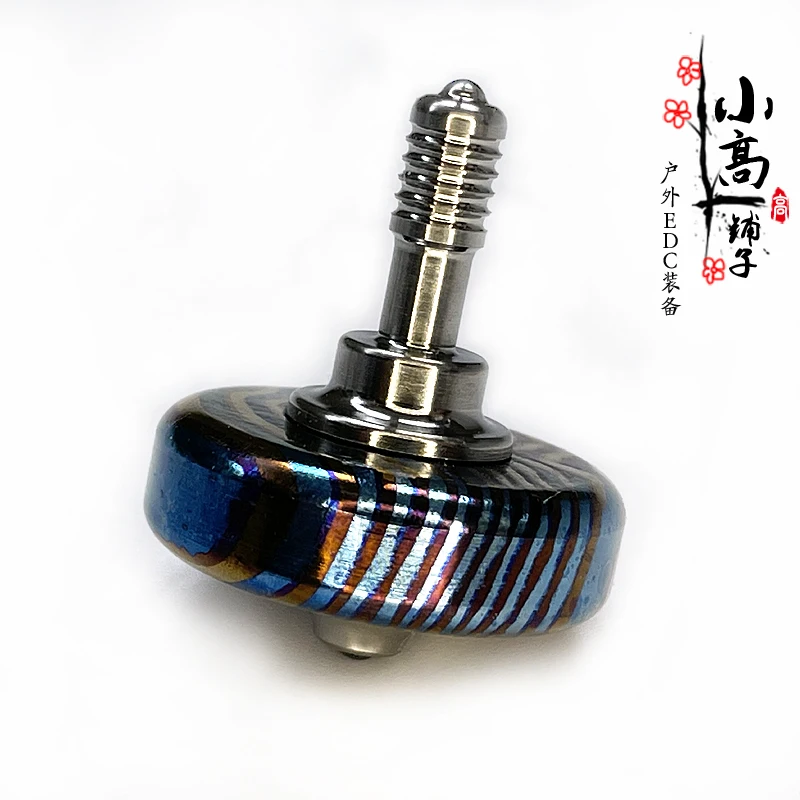 

1 Piece titanium damascus gyro hand twist gyro