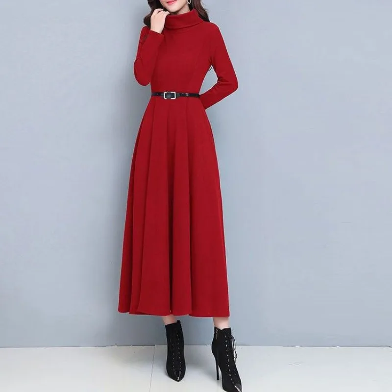 Женский осенне-зимний пуловер с высоким воротником и поясом оборками