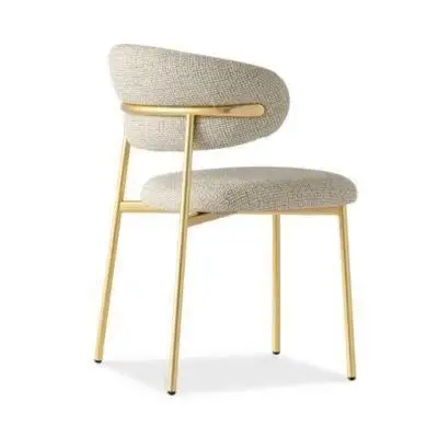 

white and golden four dining chairs