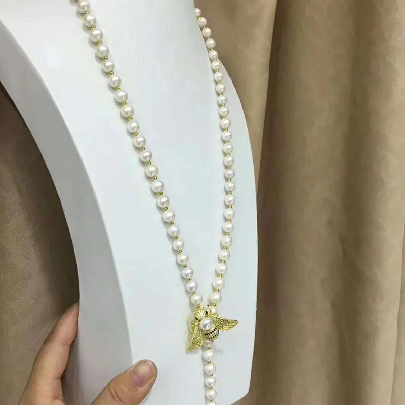 

Hot sell new super-American 9-10mm natural white freshwater pearl necklace 90cm long sweater chain micro zircon fashion jewelry