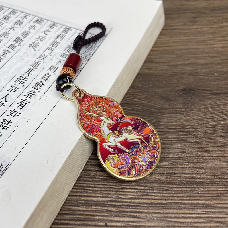 

Медный брелок Багуа с оленем