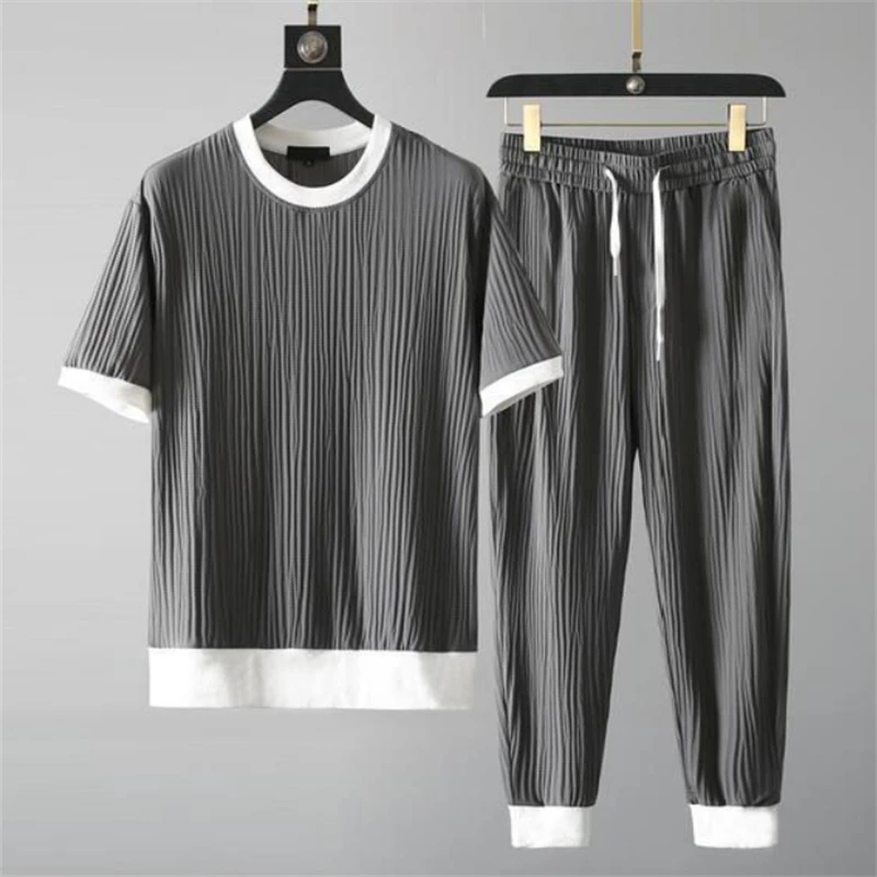 

Summer 2022 Men's Casual Two Piece Suit Solid Color Round Neck Pullover Tops Folds Men Clothes Elastic Waist Ankle Length Pants