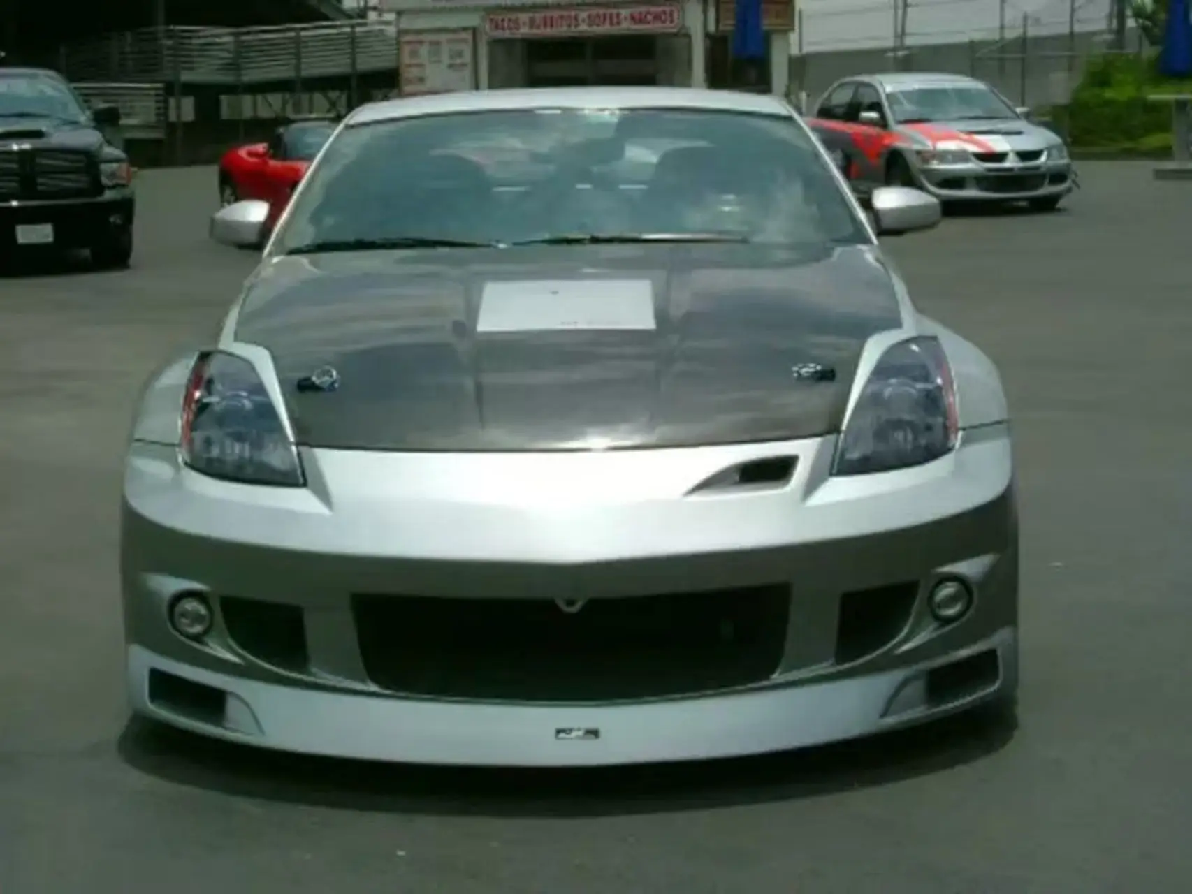 Фото Для Nissan 350Z Z33 2002-2008 годов автомобильные аксессуары FRP волокно Duraflex J-Spec стиль передний бампер подходит №3