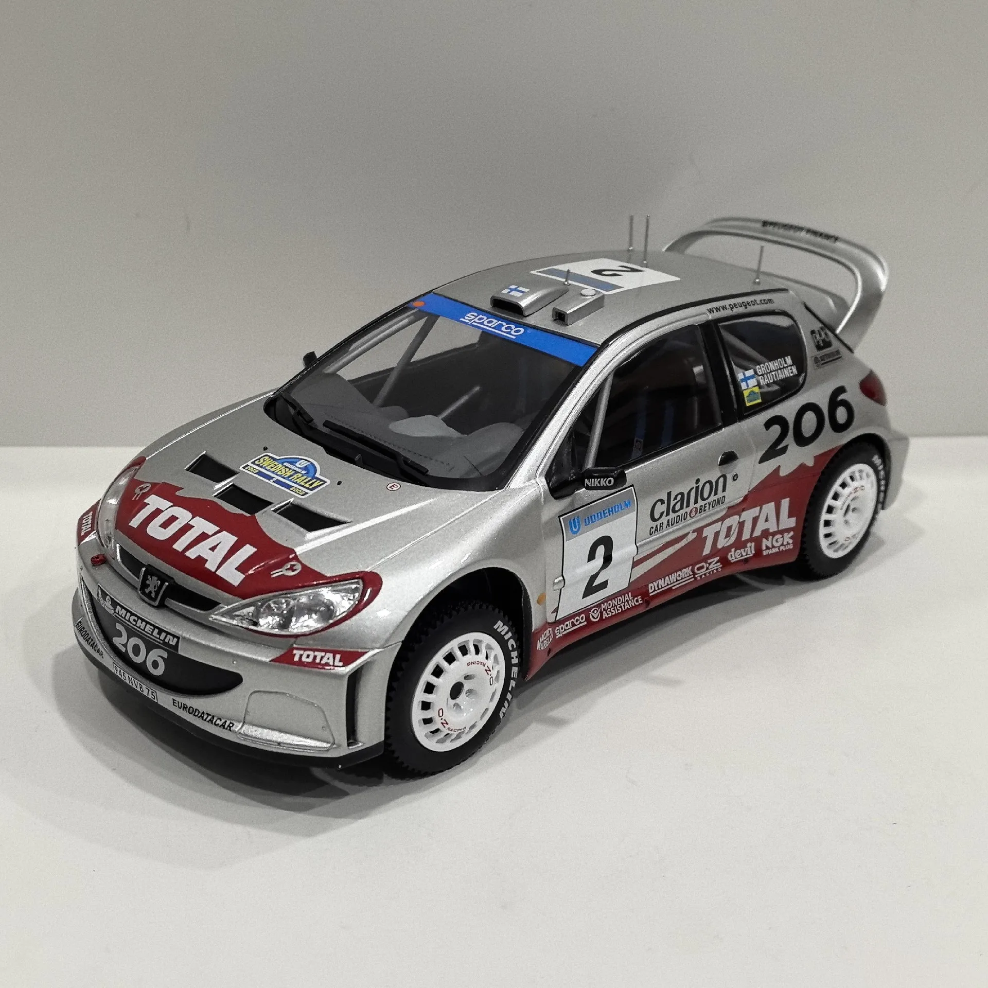 Фото Литой под давлением IXO масштаб 1/18 PEUGEOT 206 WRC # Модель автомобиля из сплава Peugeot Racing 2, Коллекционная игрушка, подарок, сувенир, украшение для дисплея №1