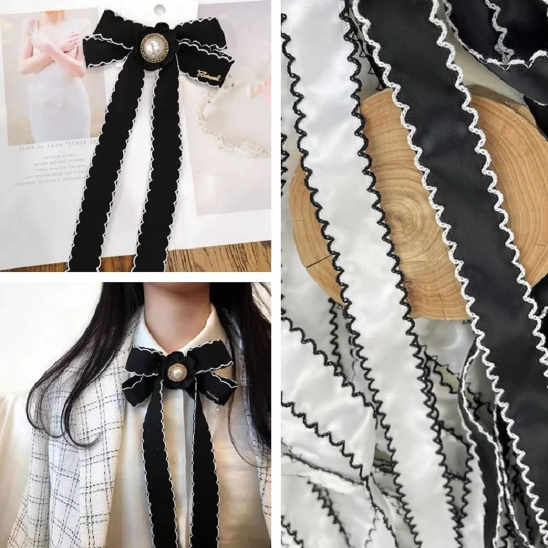 

Ленты белые и черные с вышивкой по краям, 5 ярдов