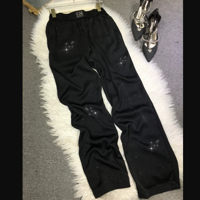 

Европейские тяжелые Промышленные Горячие бриллиантовые брюки для женщин тонкие черные женские тонкие уличные крутые атласные широкие брюки 2023