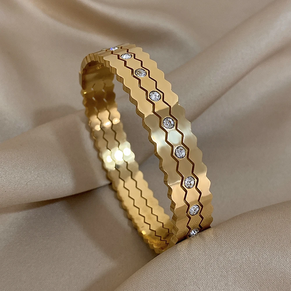 Браслет-манжета из нержавеющей стали с фианитами